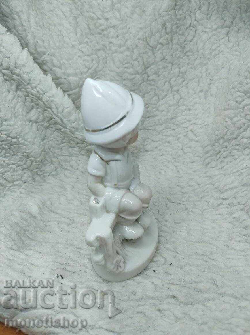 Boy on a bench figurine - old porcelain with price 30.00 BGN | € 15.34 Boy on a bench figurine - old porcelain with price 30.00 BGN | € 15.34