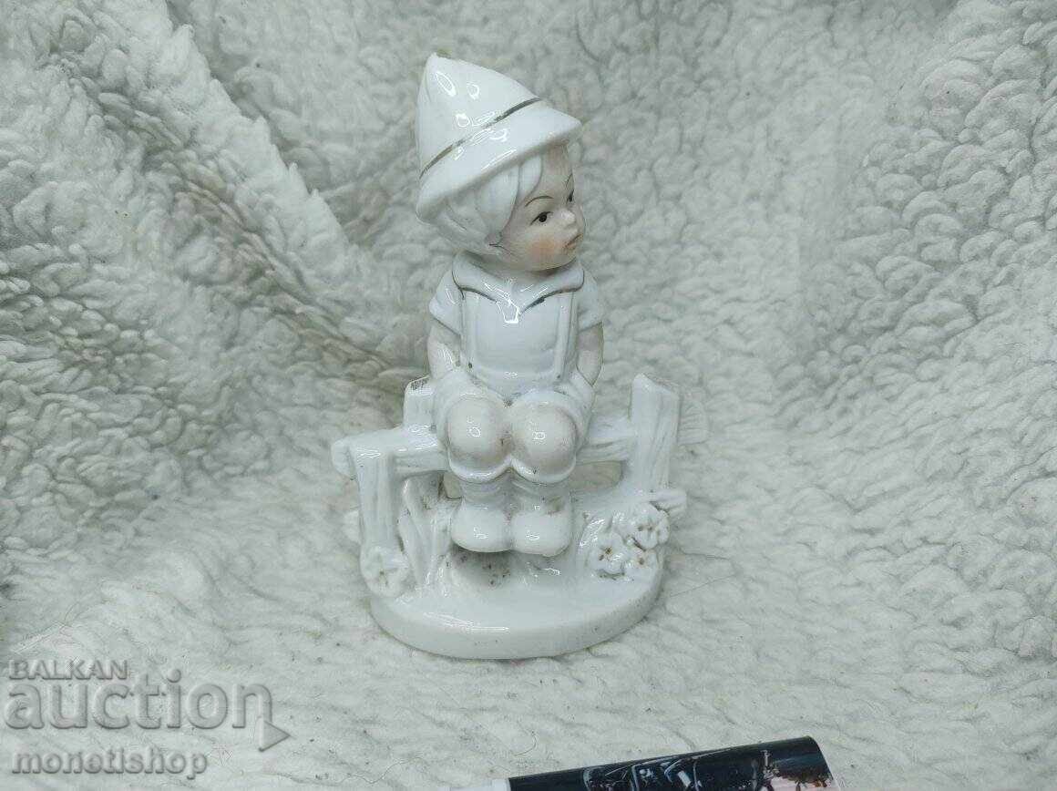 Delivery of Boy on a bench figurine - old porcelain Delivery of Boy on a bench figurine - old porcelain