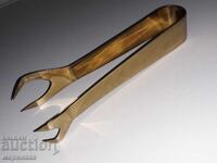 ICE CLIP. POLISHED BRASS