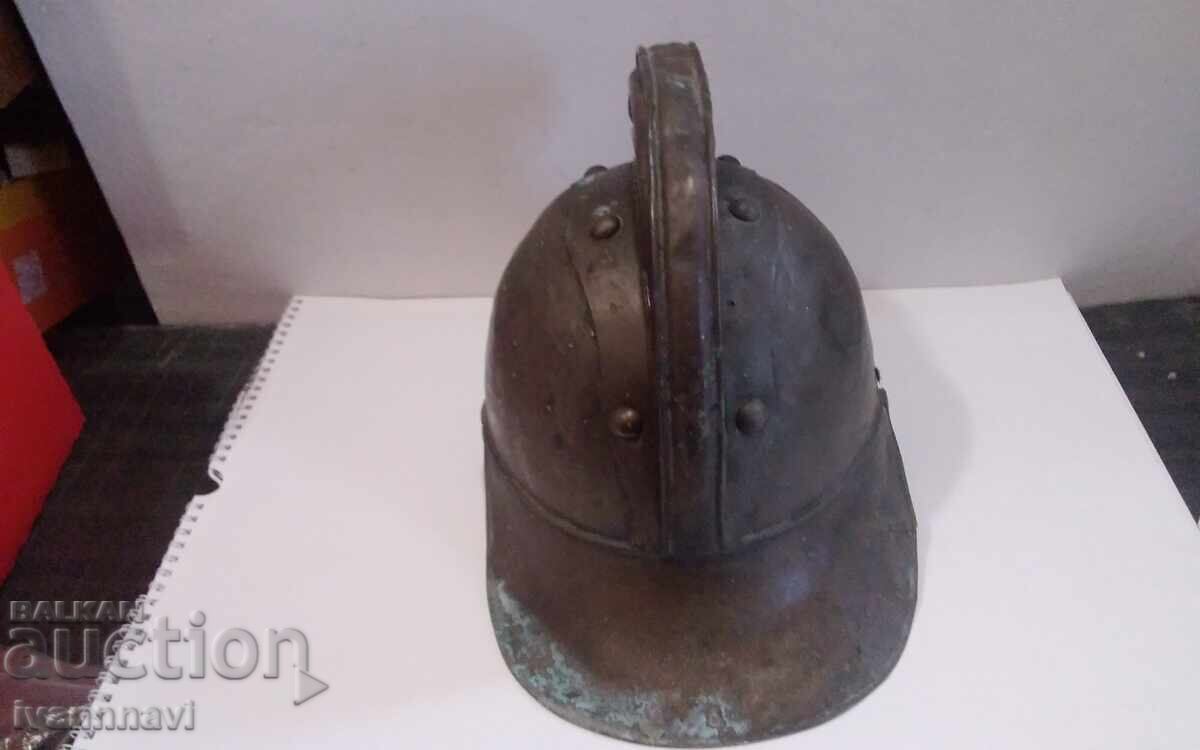 Delivery of Old fireman's helmet Delivery of Old fireman's helmet