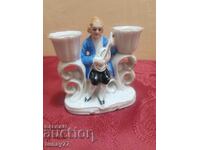 Beautiful porcelain figurine Candlestick