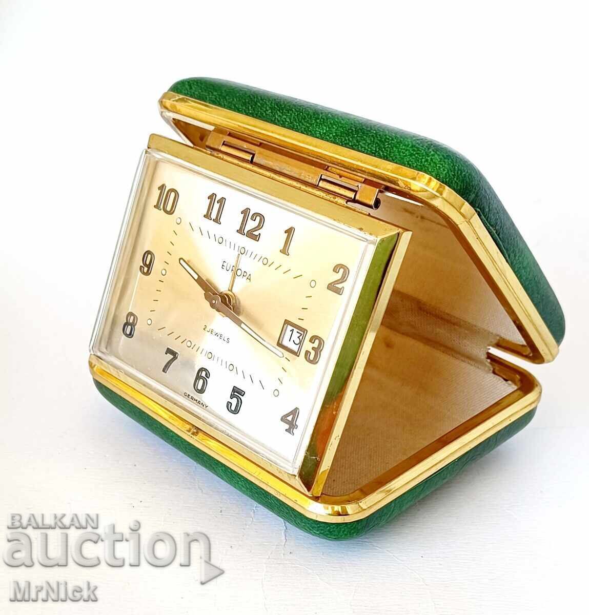 Alarm clock German Europa with leather cigarette case with price 70.00 BGN | € 35.79 Alarm clock German Europa with leather cigarette case with price 70.00 BGN | € 35.79