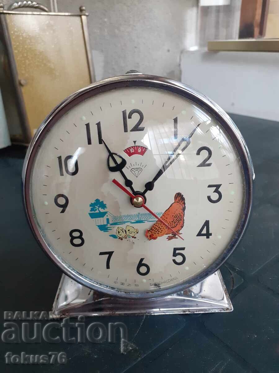 Delivery of Old Chinese animated alarm clock hen with chicks Delivery of Old Chinese animated alarm clock hen with chicks