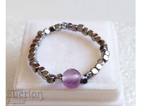 DELICATE RING WITH NATURAL AMETHYST AND STEEL (950)