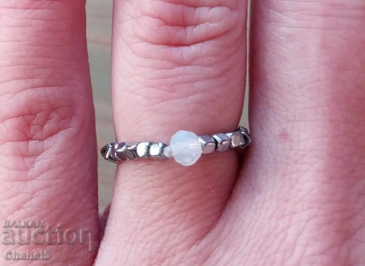 Auction GENTLE RING WITH MOONSTONE AND STEEL (952) Auction GENTLE RING WITH MOONSTONE AND STEEL (952)