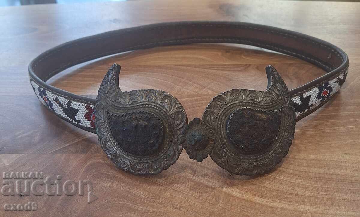 Renaissance silver buckle, leather belt, beads.
