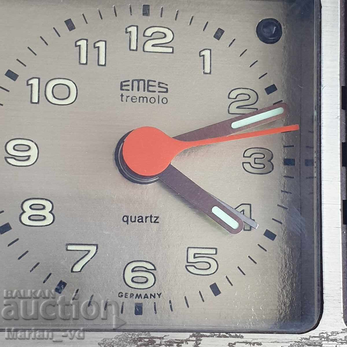 Delivery of Quartz alarm clock with three melodies