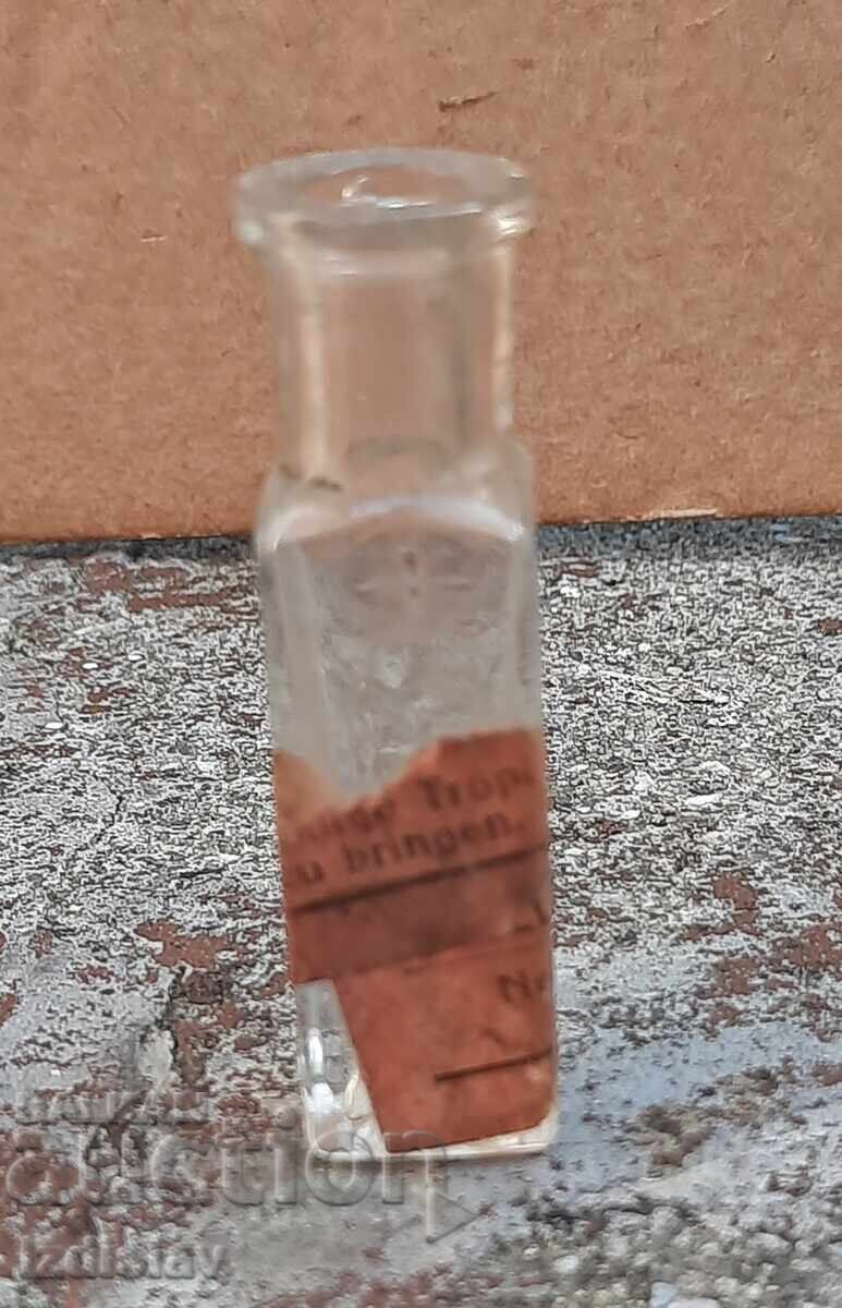 Auction Antique bottle part of a collection Auction Antique bottle part of a collection