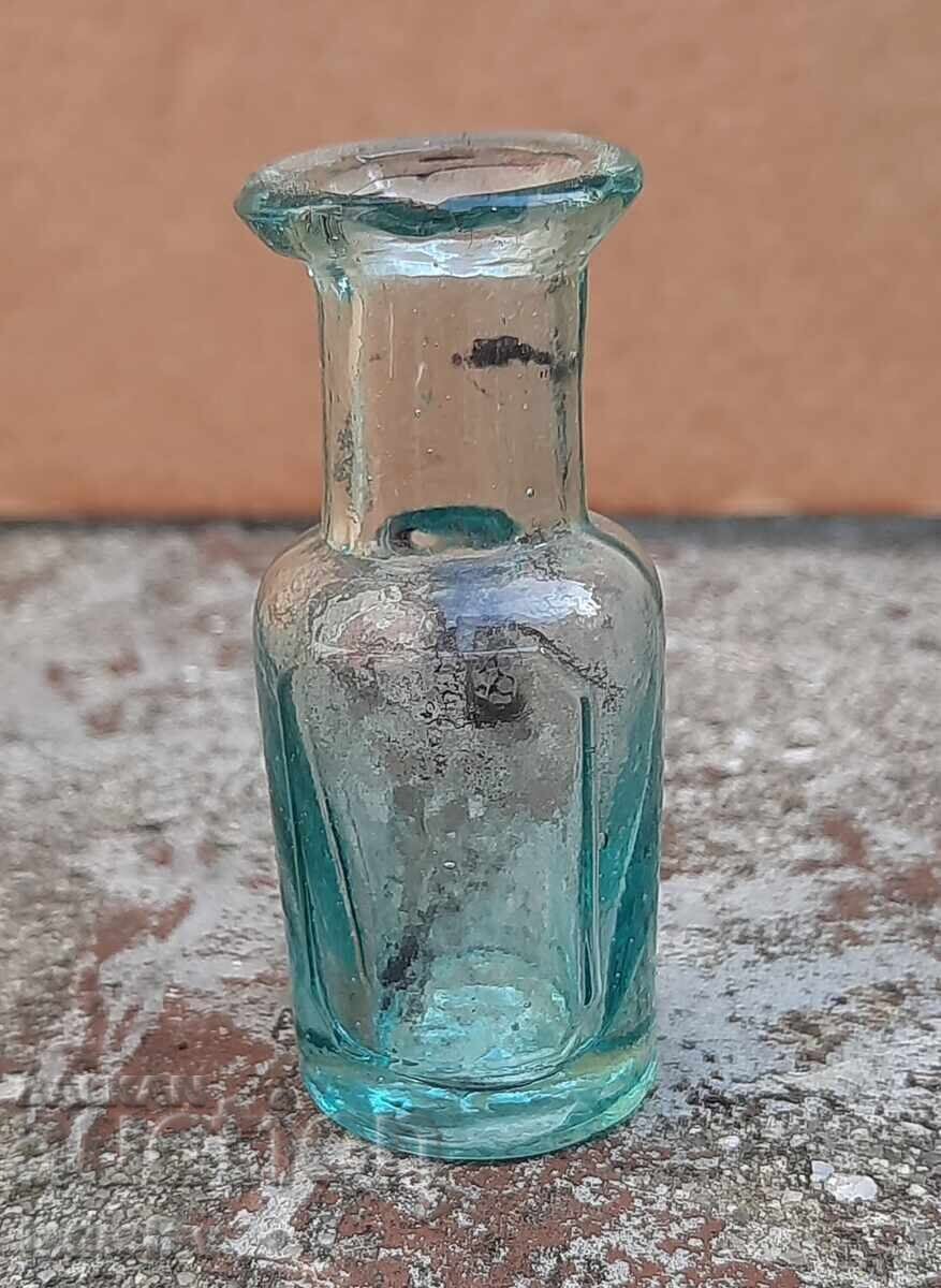 Antique bottle part of a collection Antique bottle part of a collection