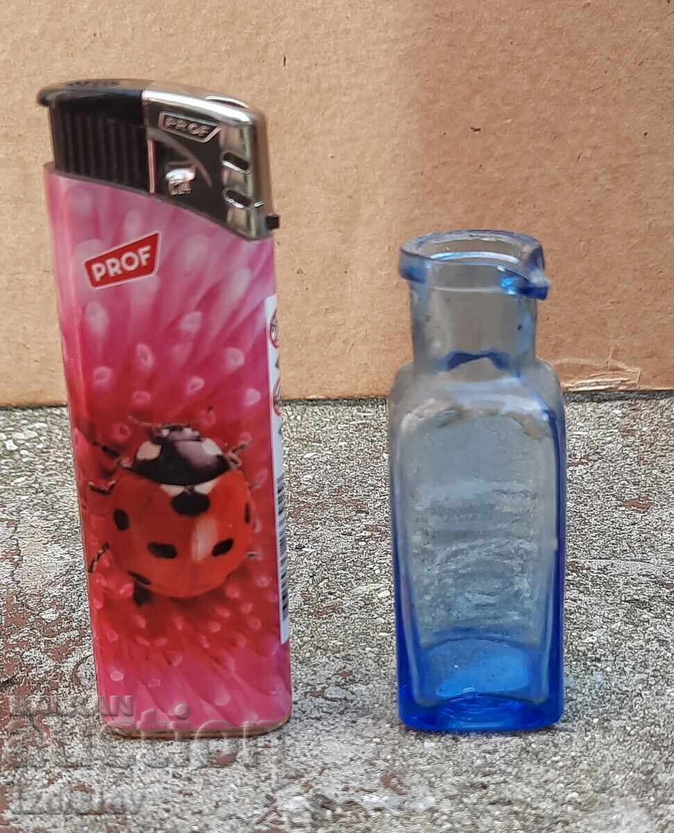 Antique bottle part of a collection Antique bottle part of a collection