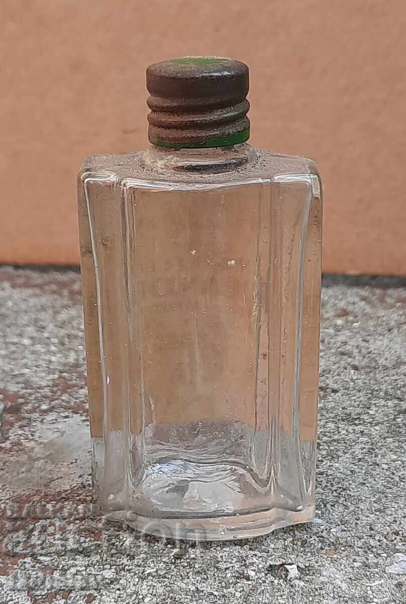 Auction Antique bottle part of a collection Auction Antique bottle part of a collection