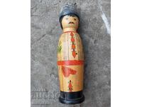 Old wooden doll