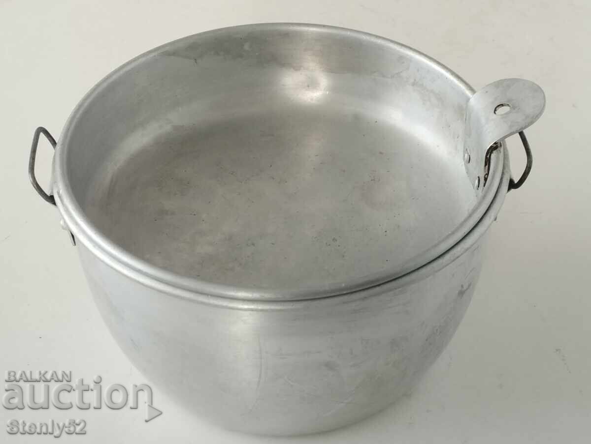 Old aluminum military can with lid