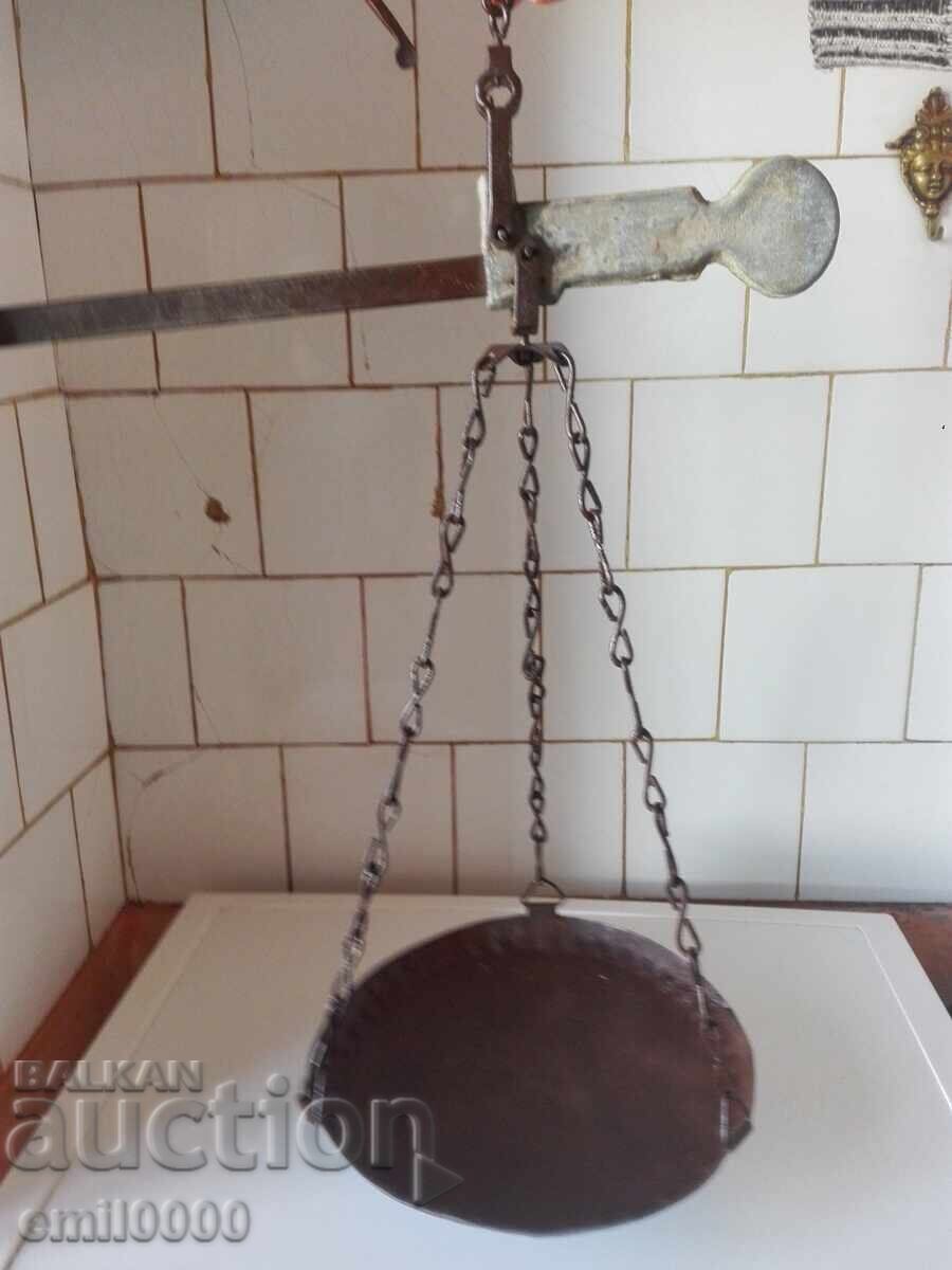 Old scale, weighing machine.