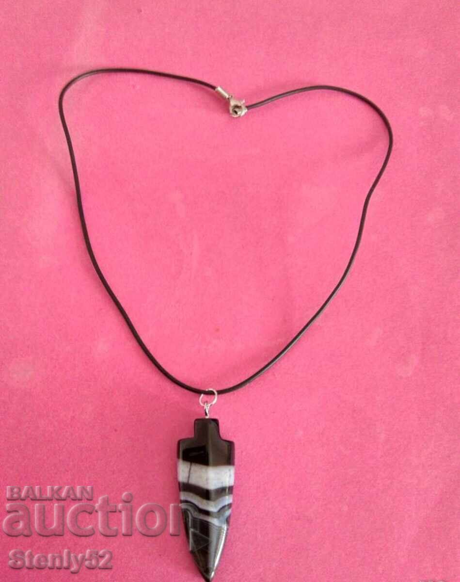 Natural stone pendant with leather cord. Natural stone pendant with leather cord.