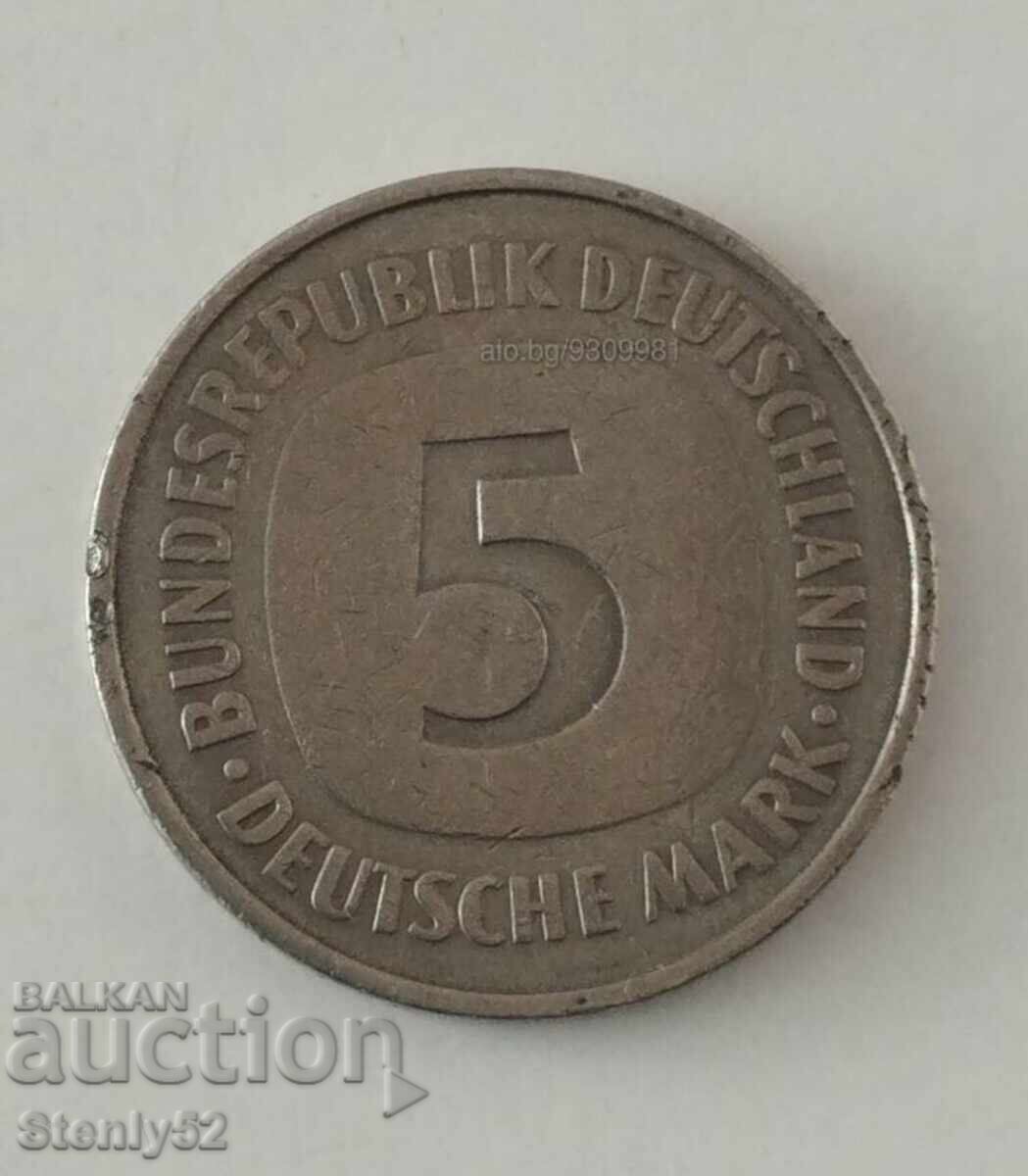 Κέρμα 5 γερμανικών μάρκων από το 1975. Κέρμα 5 γερμανικών μάρκων από το 1975.