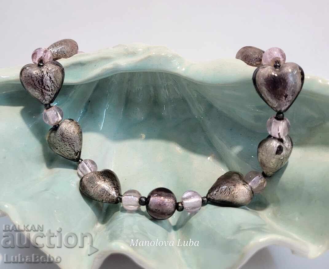 Delivery of Venetian Murano glass necklace.