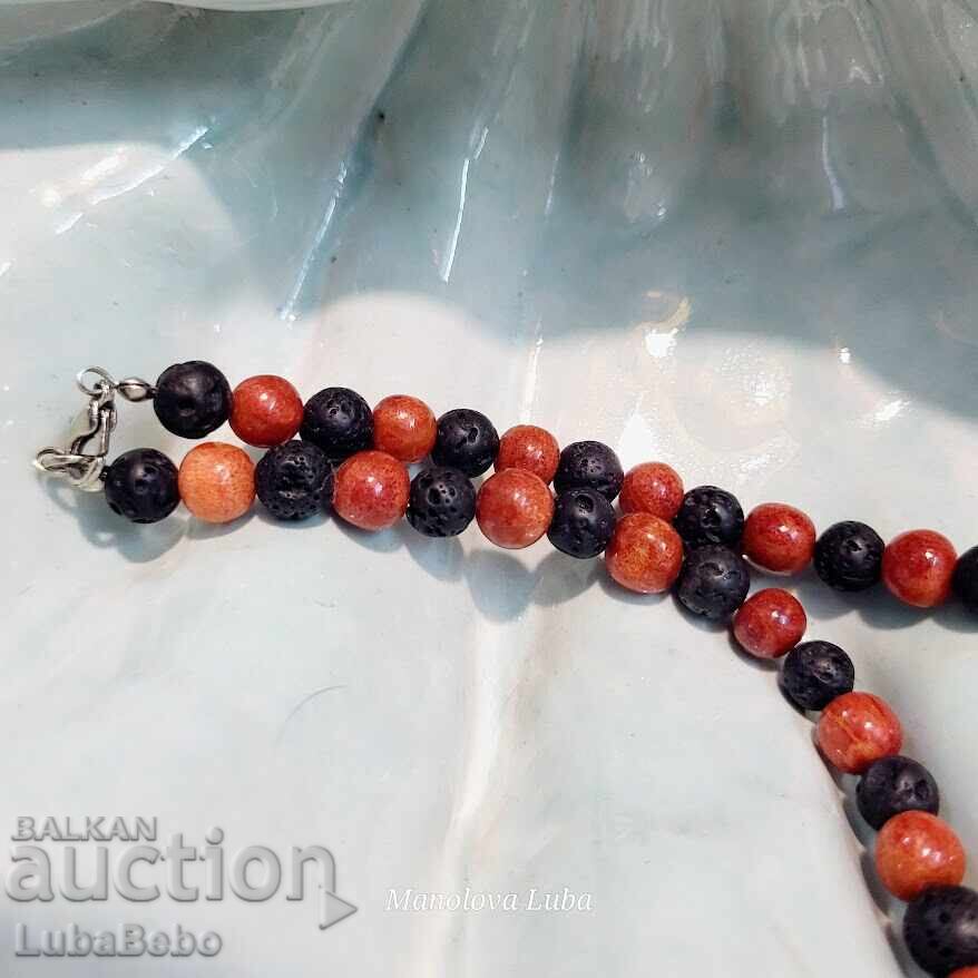 Auction Necklace made of volcanic stone beads Lava and red coral. Auction Necklace made of volcanic stone beads Lava and red coral.