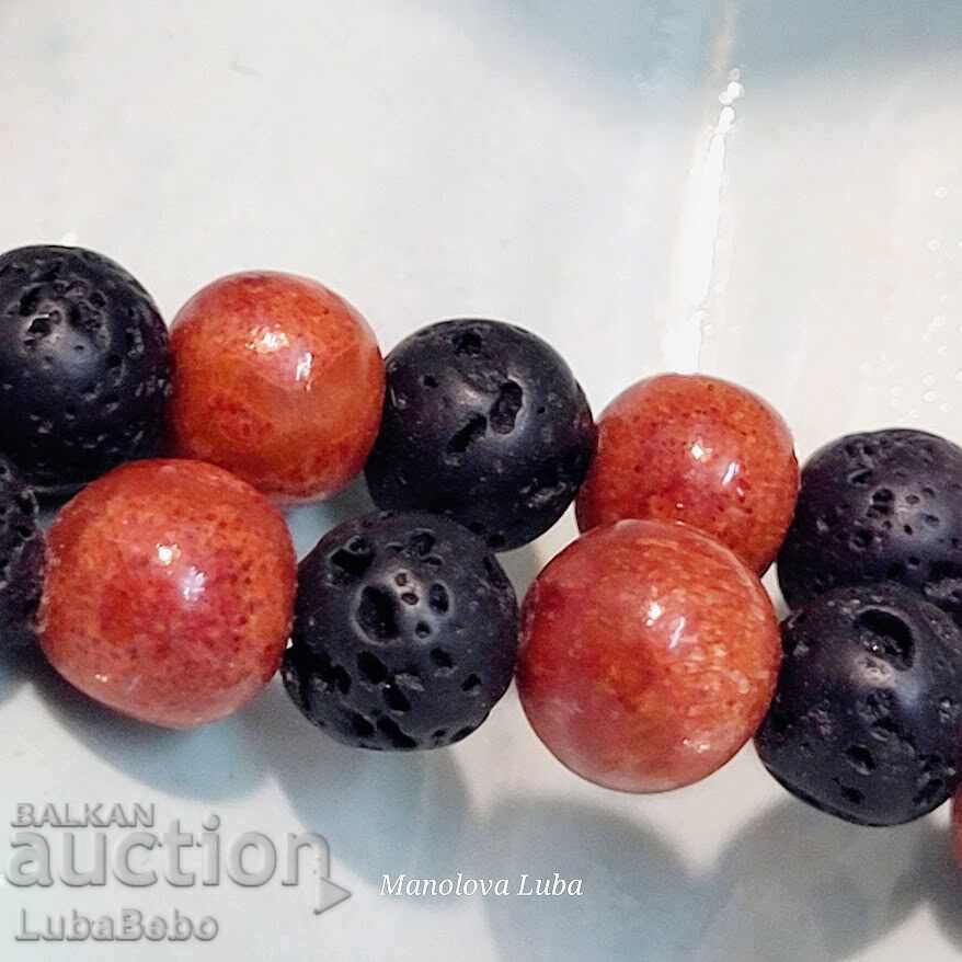 Delivery of Necklace made of volcanic stone beads Lava and red coral. Delivery of Necklace made of volcanic stone beads Lava and red coral.