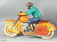 Old Russian metal mechanical toy model motorbike biker