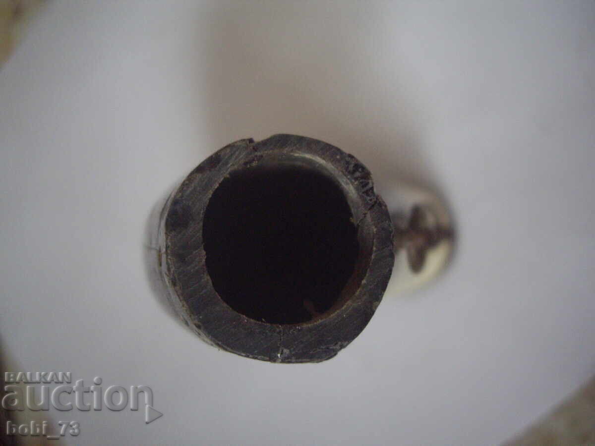 Auction  An old powder magazine with missing parts.