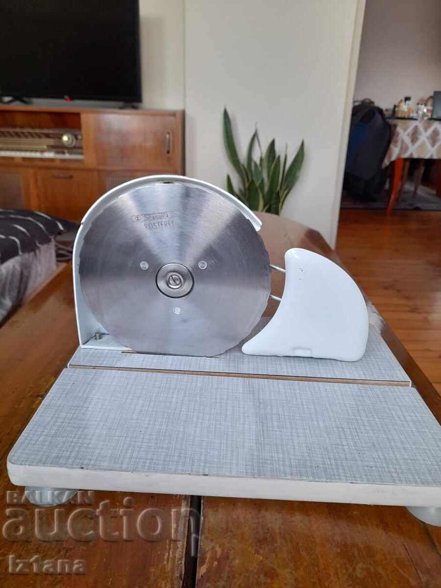 Delivery of Old device for cutting bread, sausages, slicer Delivery of Old device for cutting bread, sausages, slicer