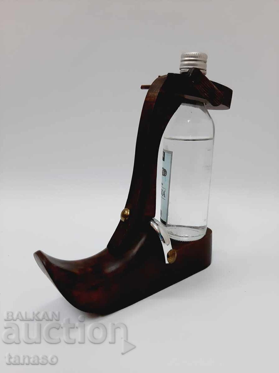 Delivery of Old wooden figure, shoe, small bottle stand