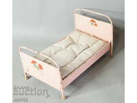 Old metal toy bed for dollhouse