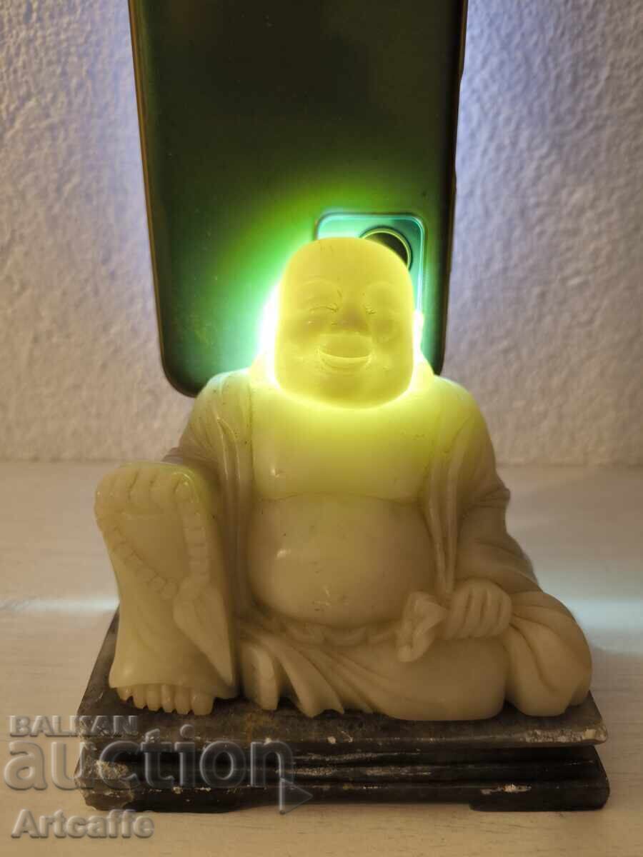 old Chinese sculpture of the happy Buddha old Chinese sculpture of the happy Buddha