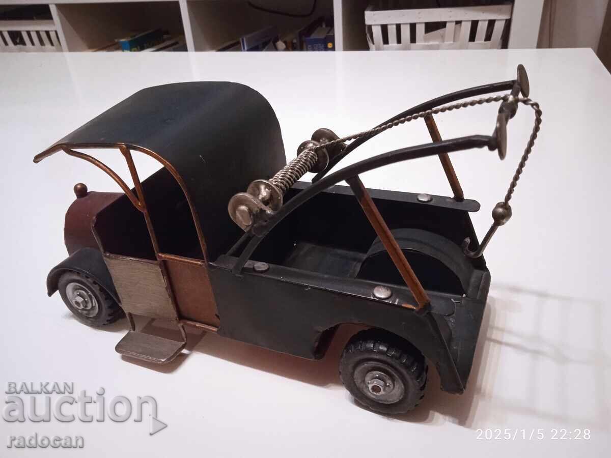 A big old metal cart, a roadside assistance pickup. - 6 A big old metal cart, a roadside assistance pickup. - 6