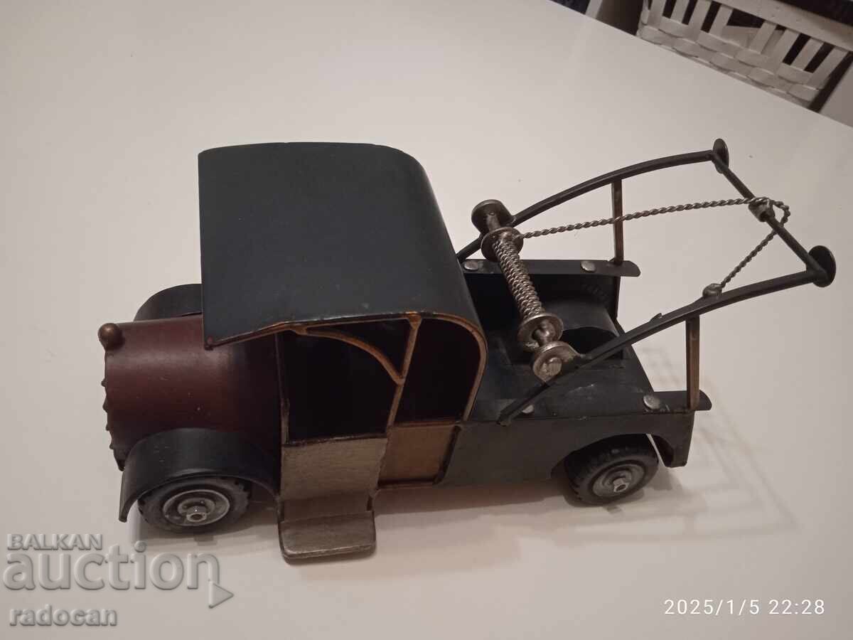 A big old metal cart, a roadside assistance pickup. - 7 A big old metal cart, a roadside assistance pickup. - 7