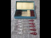 Set of forks and spoons with red enamel