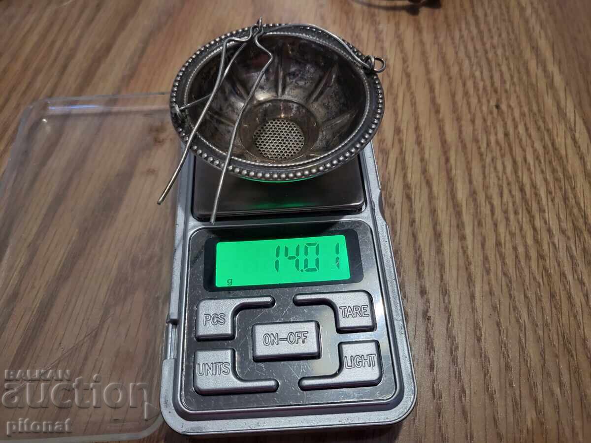 Delivery of Antique silver strainer Delivery of Antique silver strainer