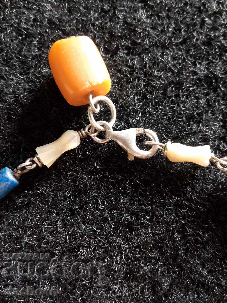 Silver bracelet amber lapis lazuli coral turquoise mother of pearl tiger eye with price 60.00 BGN | € 30.68 Silver bracelet amber lapis lazuli coral turquoise mother of pearl tiger eye with price 60.00 BGN | € 30.68