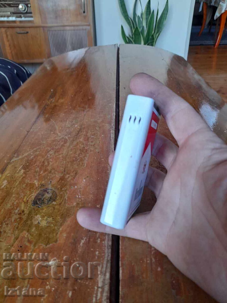 Auction  Old cigarette case, Marlboro lighter