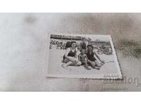 Photo Varna Two young women, a boy and a girl on the beach