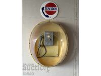 Telefon cu monede de stradă