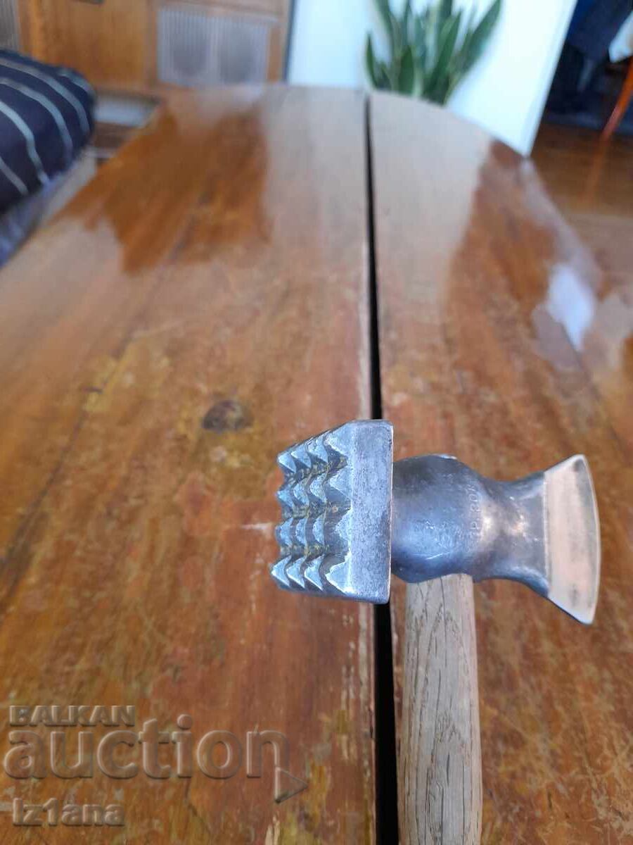 Delivery of Old meat mallet, hammer, cleaver