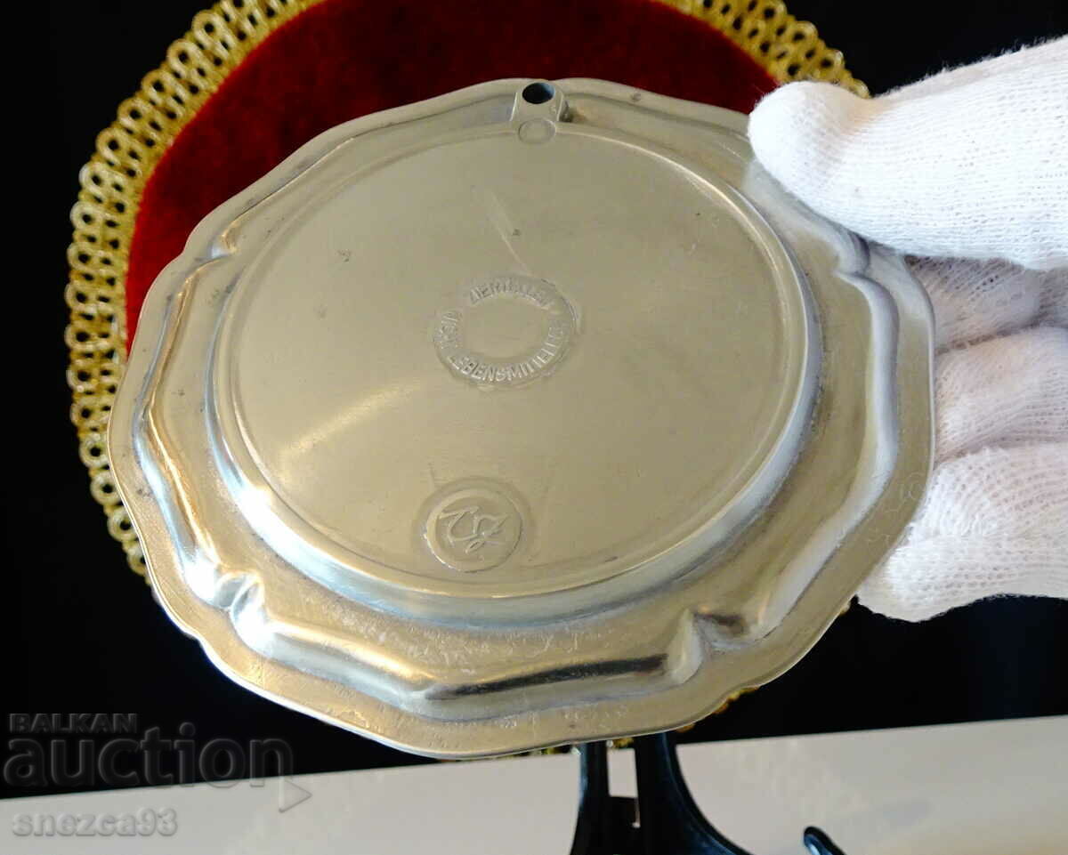 A pewter plate with a variety of vines, marked. with price 5.00 BGN | € 2.56 A pewter plate with a variety of vines, marked. with price 5.00 BGN | € 2.56