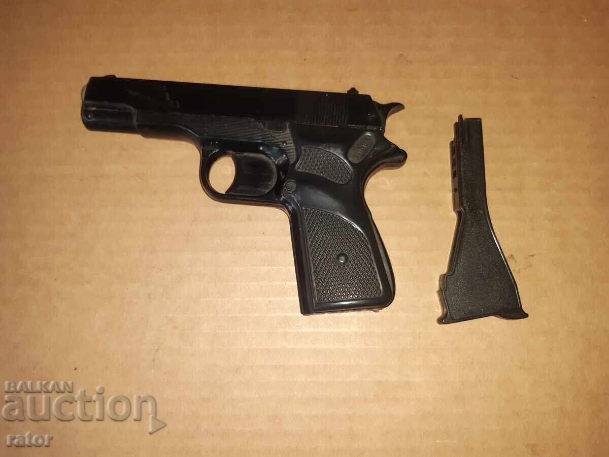 Auction  Old toy - a gun with caps