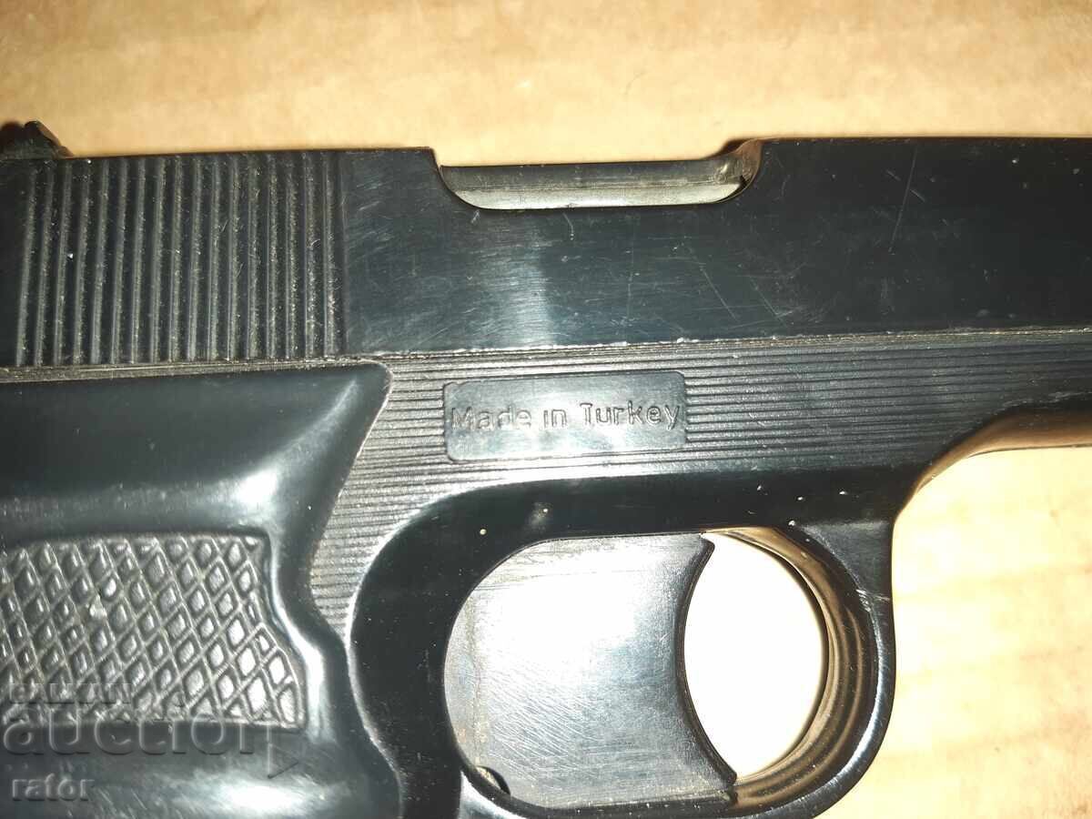 Old toy - a gun with caps - 5