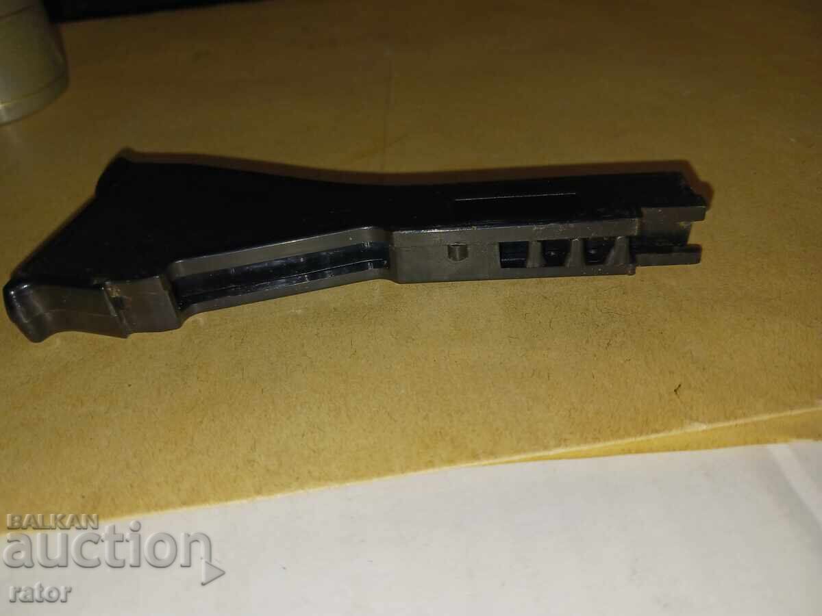 Old toy - a gun with caps - 7