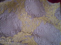 old embossed upholstery fabric gold motifs