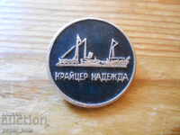 cruiser Nadezhda badge