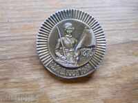 badge "Princess Raina - 1876"