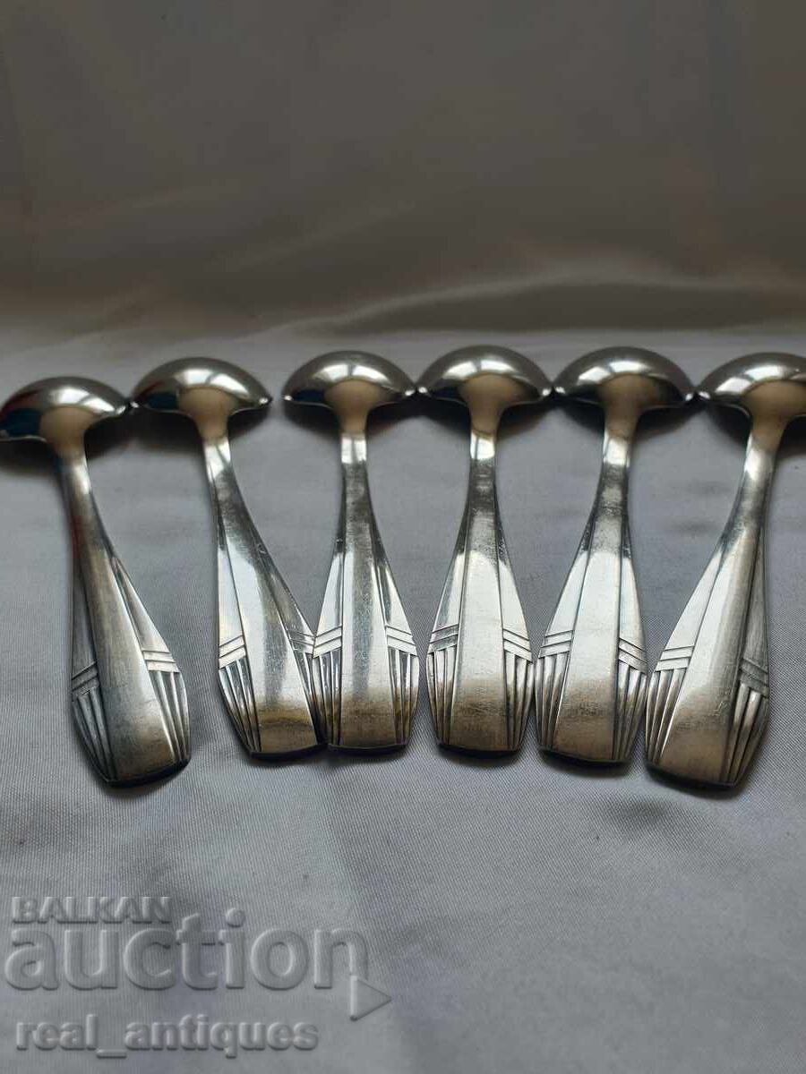 Auction Set of silver plated spoons Auction Set of silver plated spoons