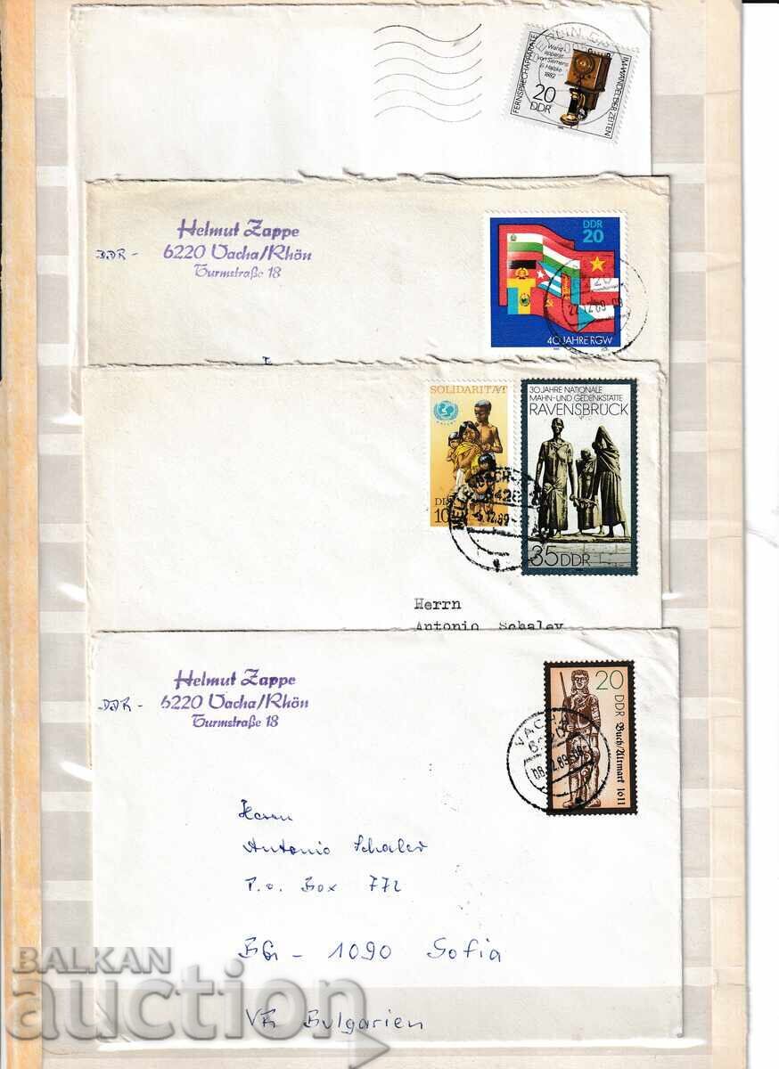GDR - 4 used postal envelopes.