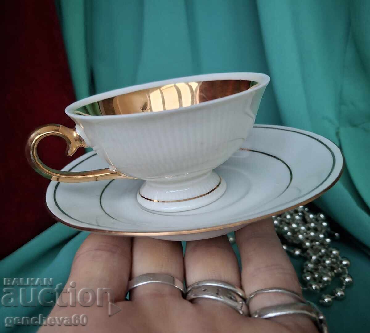 Beautiful coffee cup with saucer with price 15.00 BGN | € 7.67 Beautiful coffee cup with saucer with price 15.00 BGN | € 7.67
