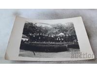 Photo Schoolgirls around a fountain in the park