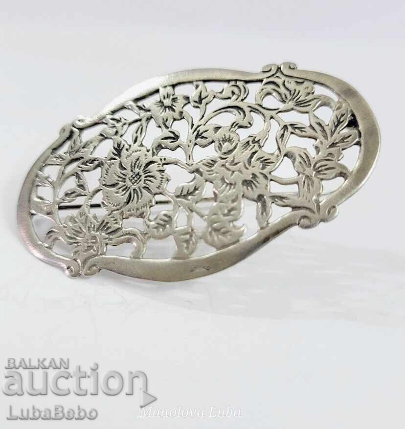 Livrarea Broșă retro argintie cu design floral.